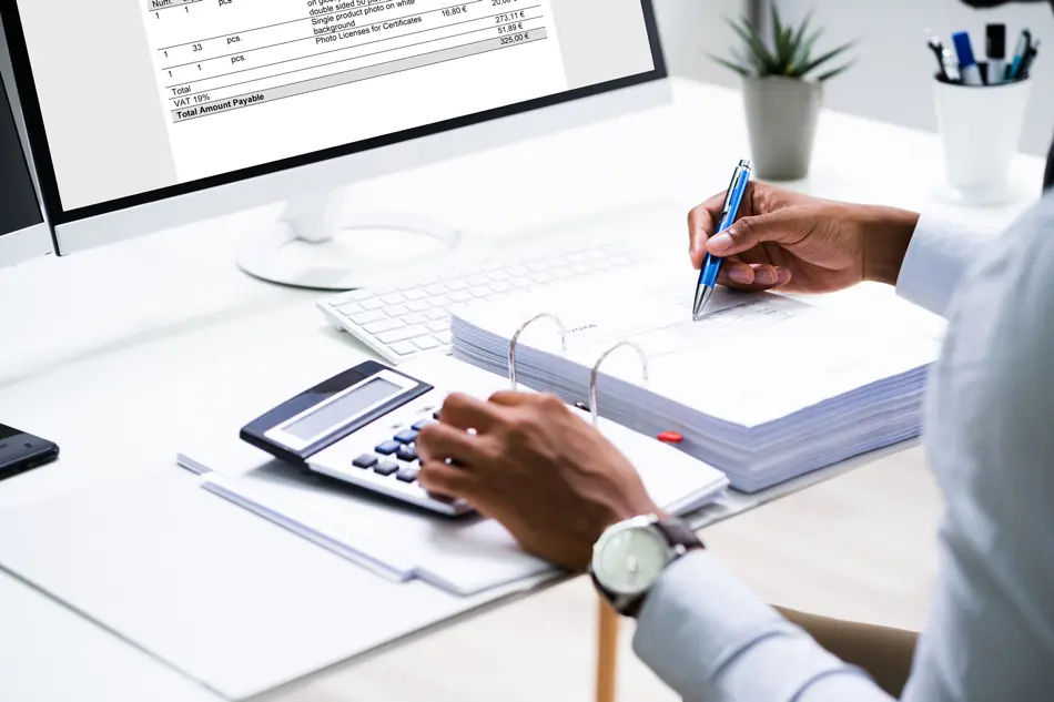 Certified accountant calculating finances